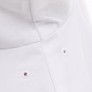 Détail oeillet d'aération sur la veste Harti blanche avec liseré écru de la marque Robur